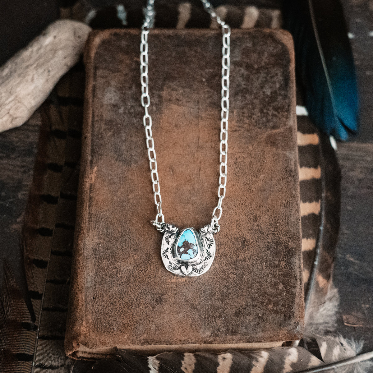 Protect this Cowgirl Lavender Turquoise Horseshoe Necklace